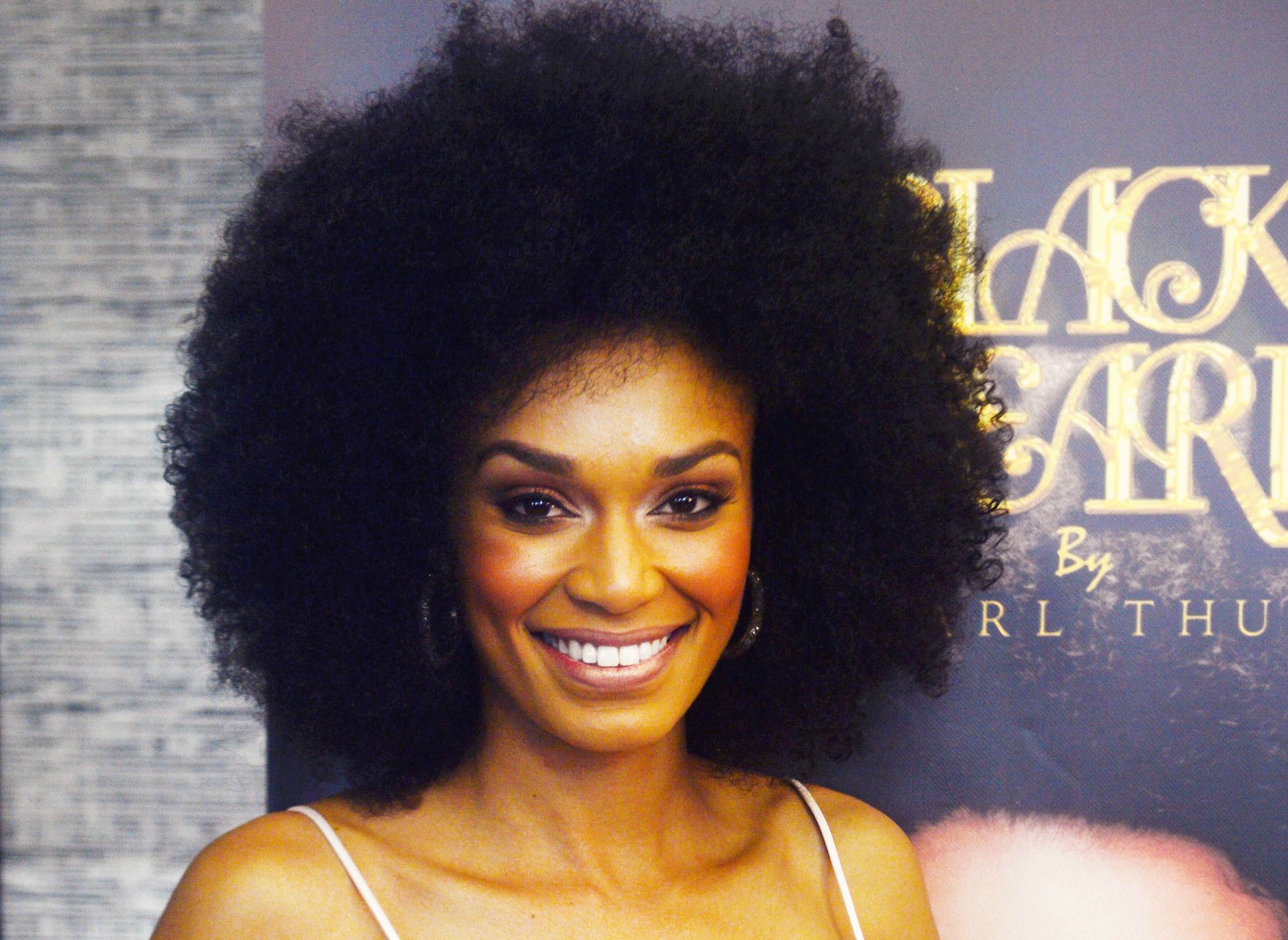 Pearl thusi afro african proud