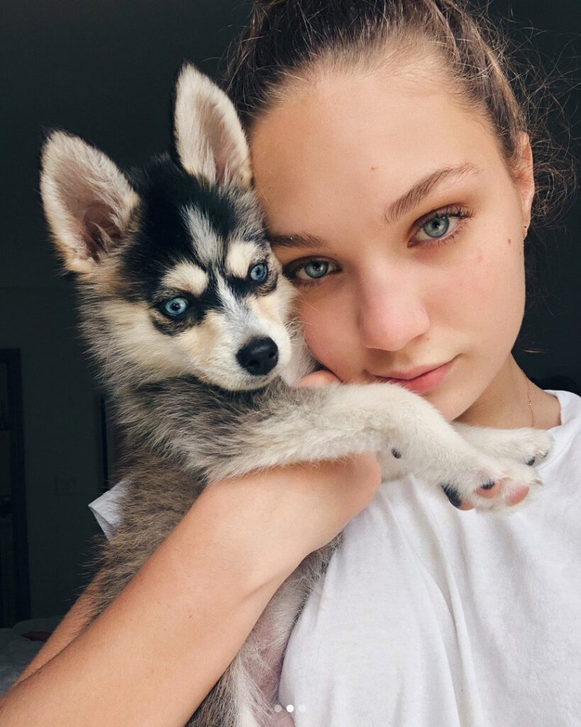 Maddie with a dog