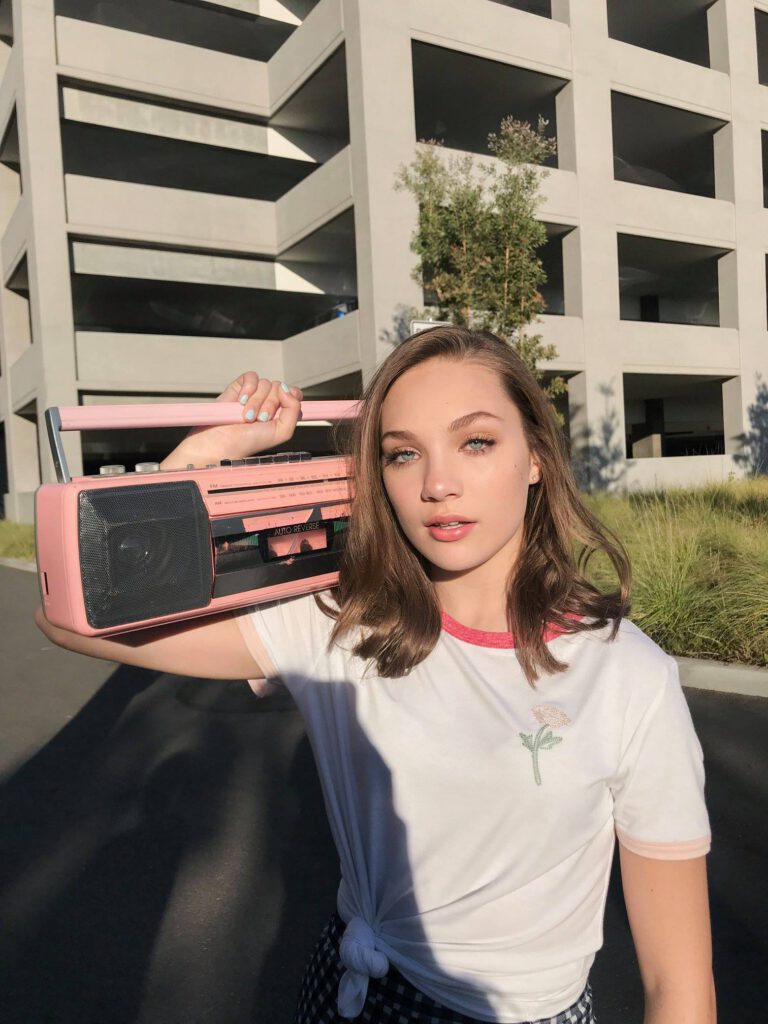 Maddie with old radio