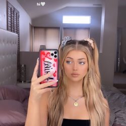 Loren gray with her iphone