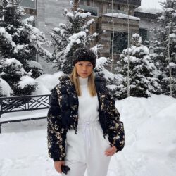 Outside in snow white outfit